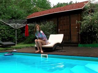 Hungarian petite skinny femme fatale Hermione nude in pool