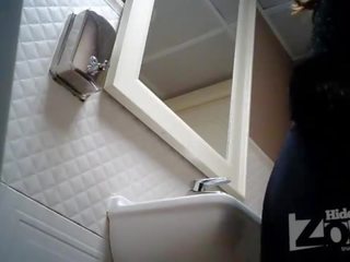 Skrytý kamera v the záchod na a bar.