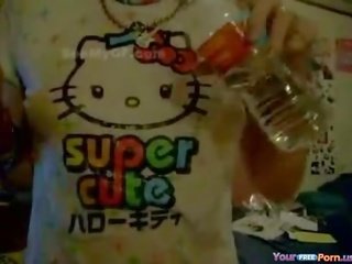Enchanting Japanese young woman With Wet Hello Kitty T-Shirt
