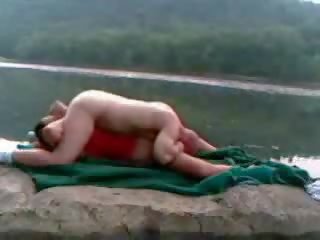 Couple get fantastic and naughty fucking beside the lake video
