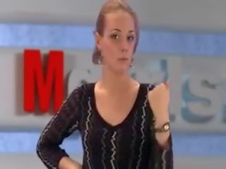 Russian Moscow young female Doing TV News