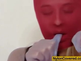 Hot blonde red spandex mask on her face